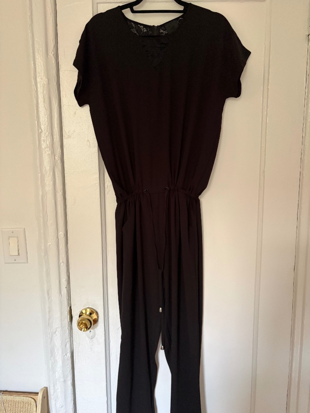 Black jumpsuit with lace detail